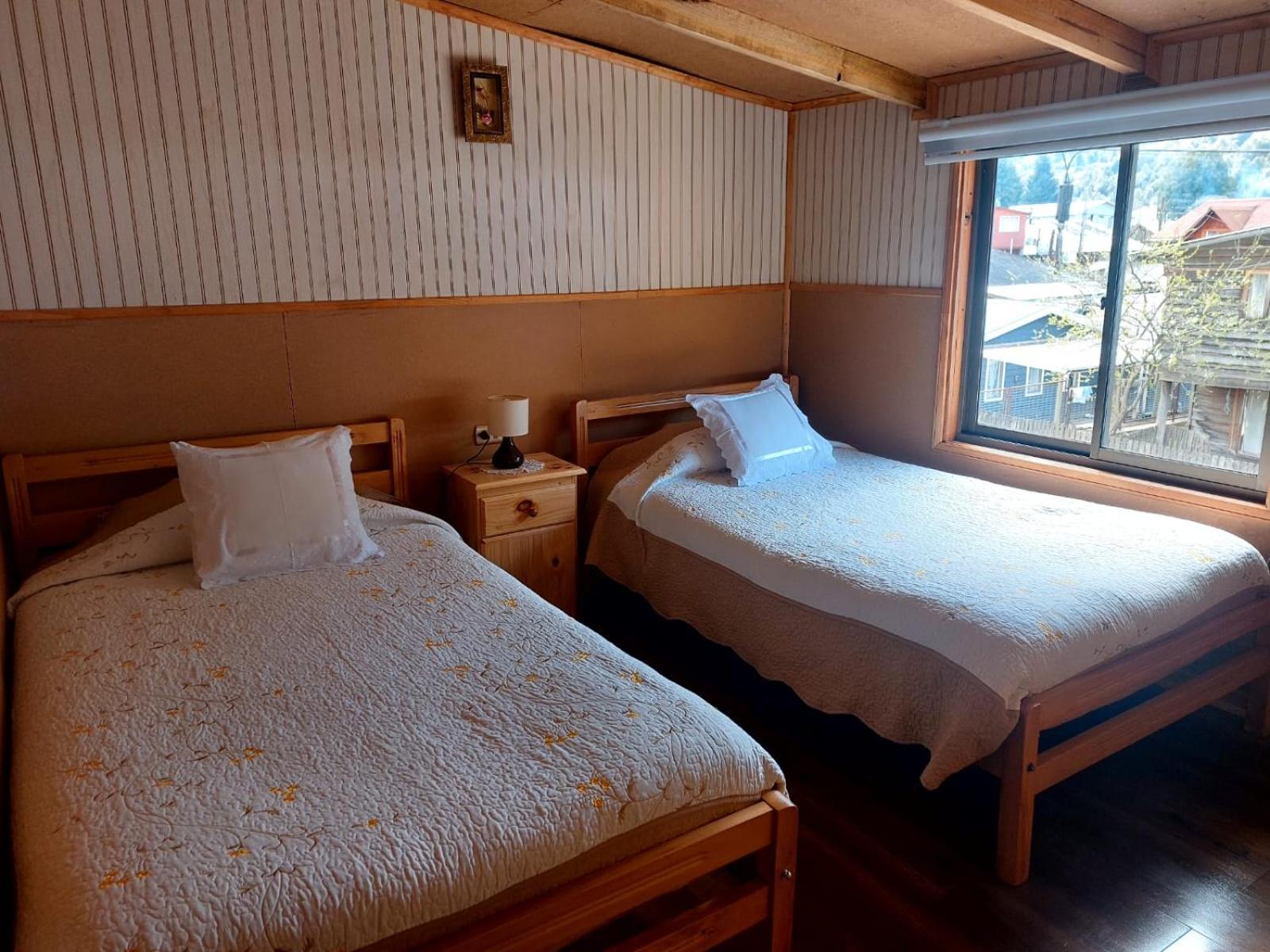 Hostal Y Cabanas Ventisquero Puerto Puyuguapi Extérieur photo